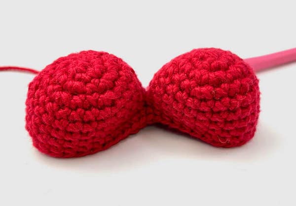 red yarn and a crochet hook