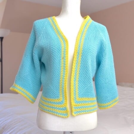 Crochet Hexagon Cardigan on a mannequin