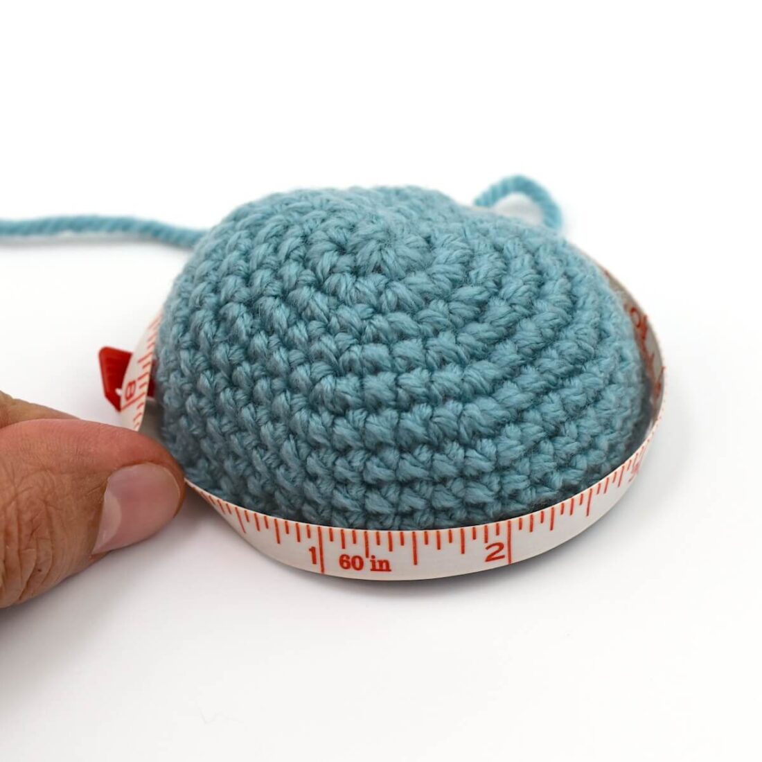 Blue yarn and tape