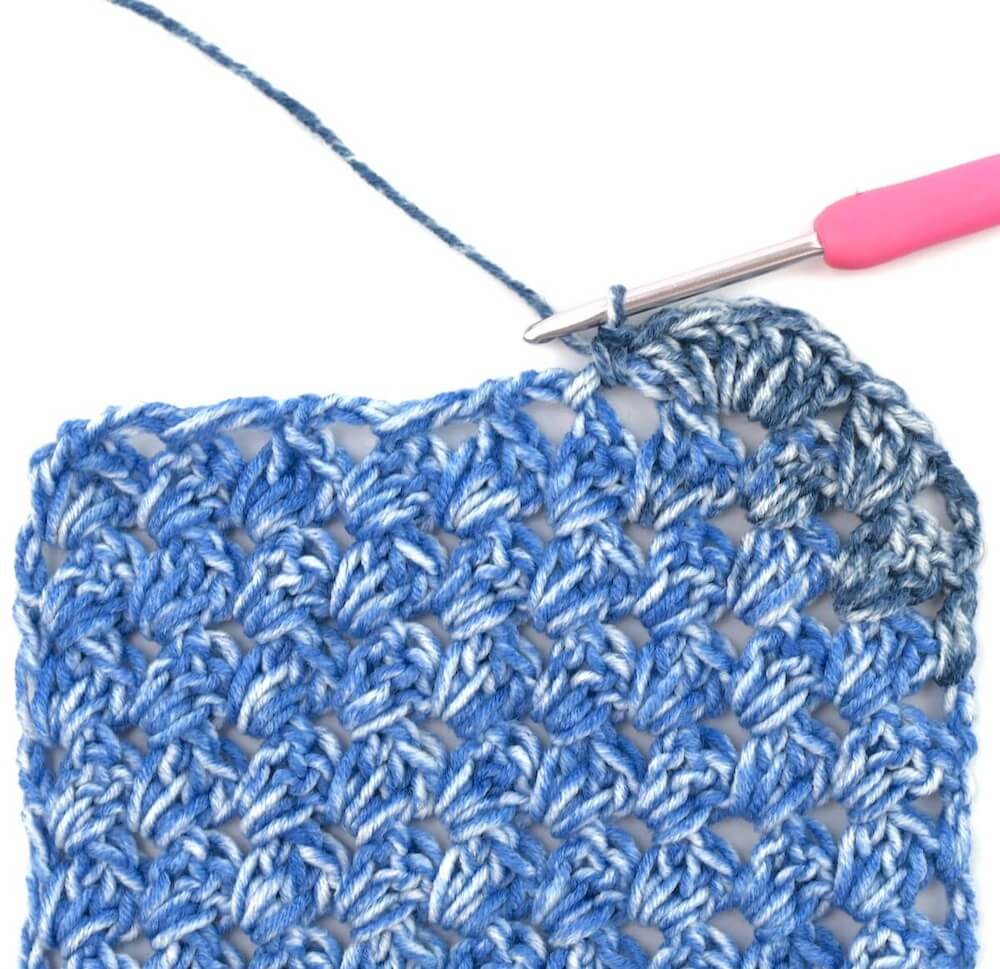 blue yarn and crochet hook