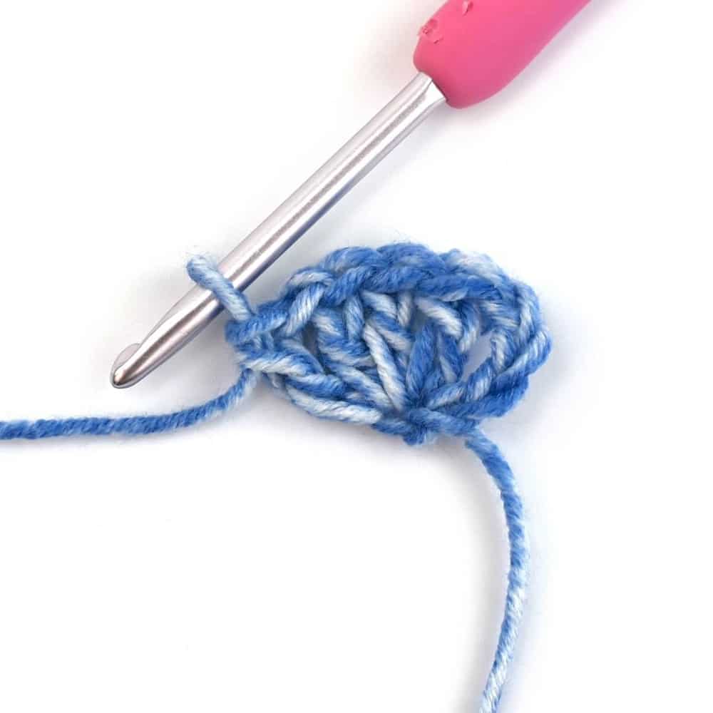 blue yarn and crochet hook