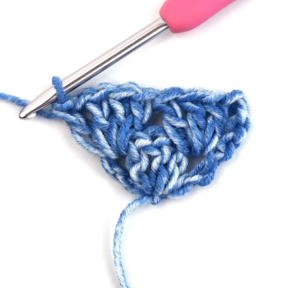 blue yarn and crochet hook