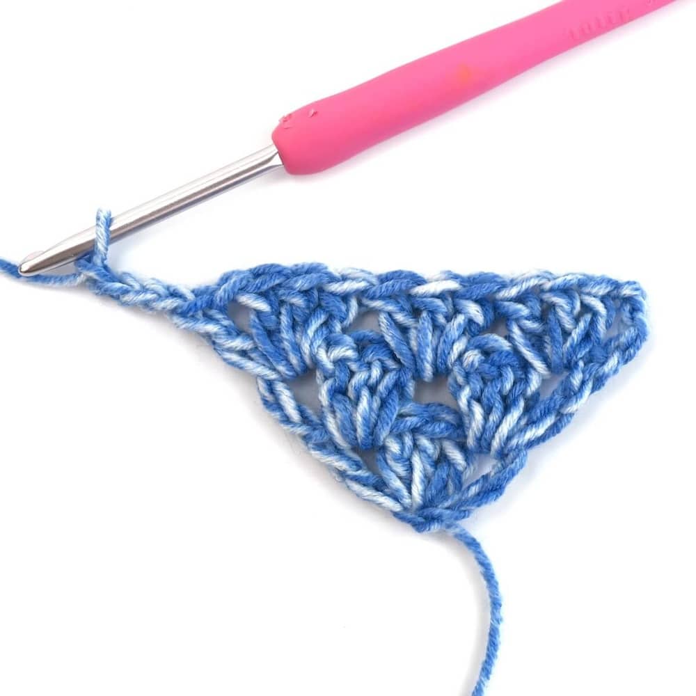 blue yarn and crochet hook
