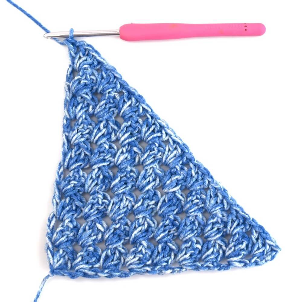 blue yarn and crochet hook