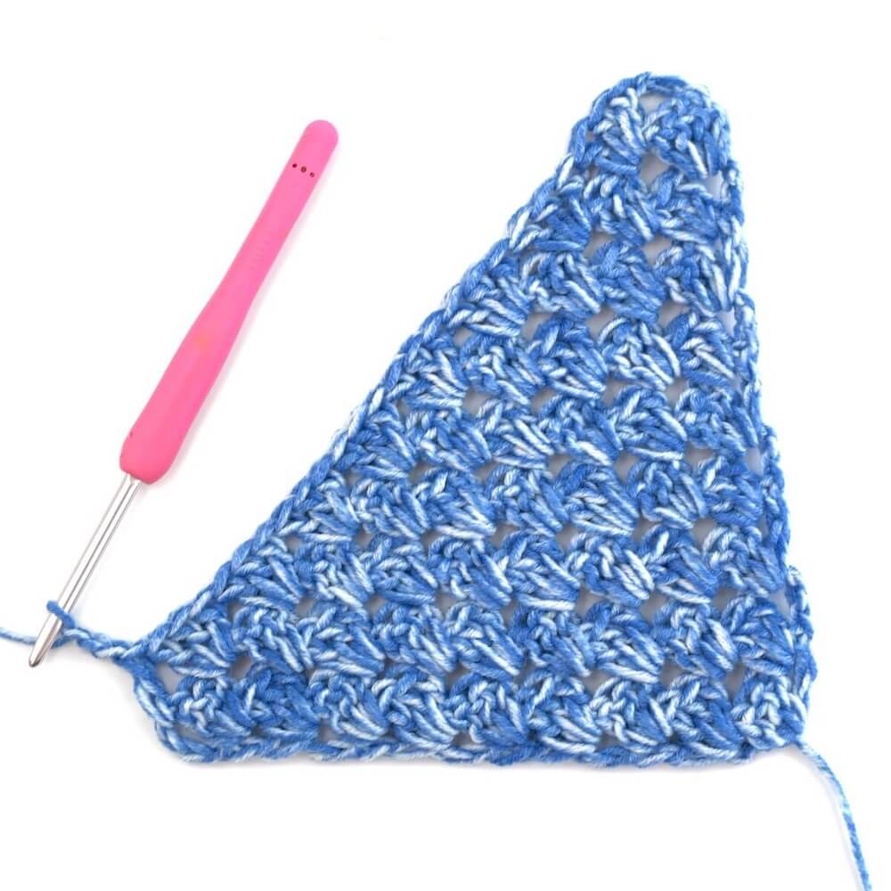 blue yarn and crochet hook