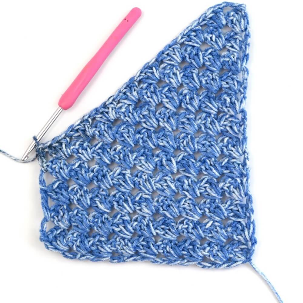 blue yarn and crochet hook