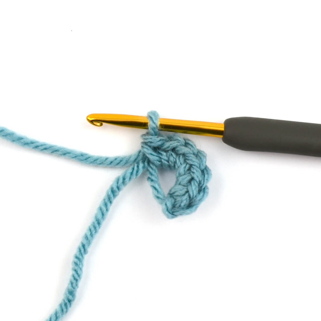 blue yarn and crochet hook