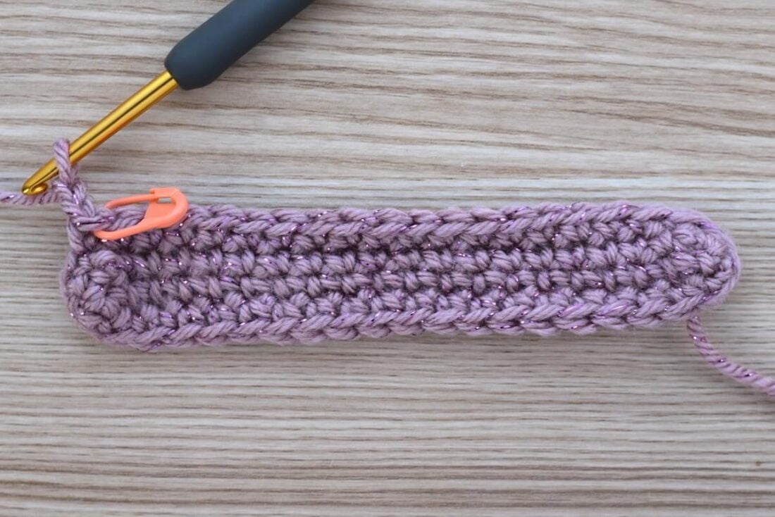 Close-up of the crochet base after completing the first few rounds in single crochet.