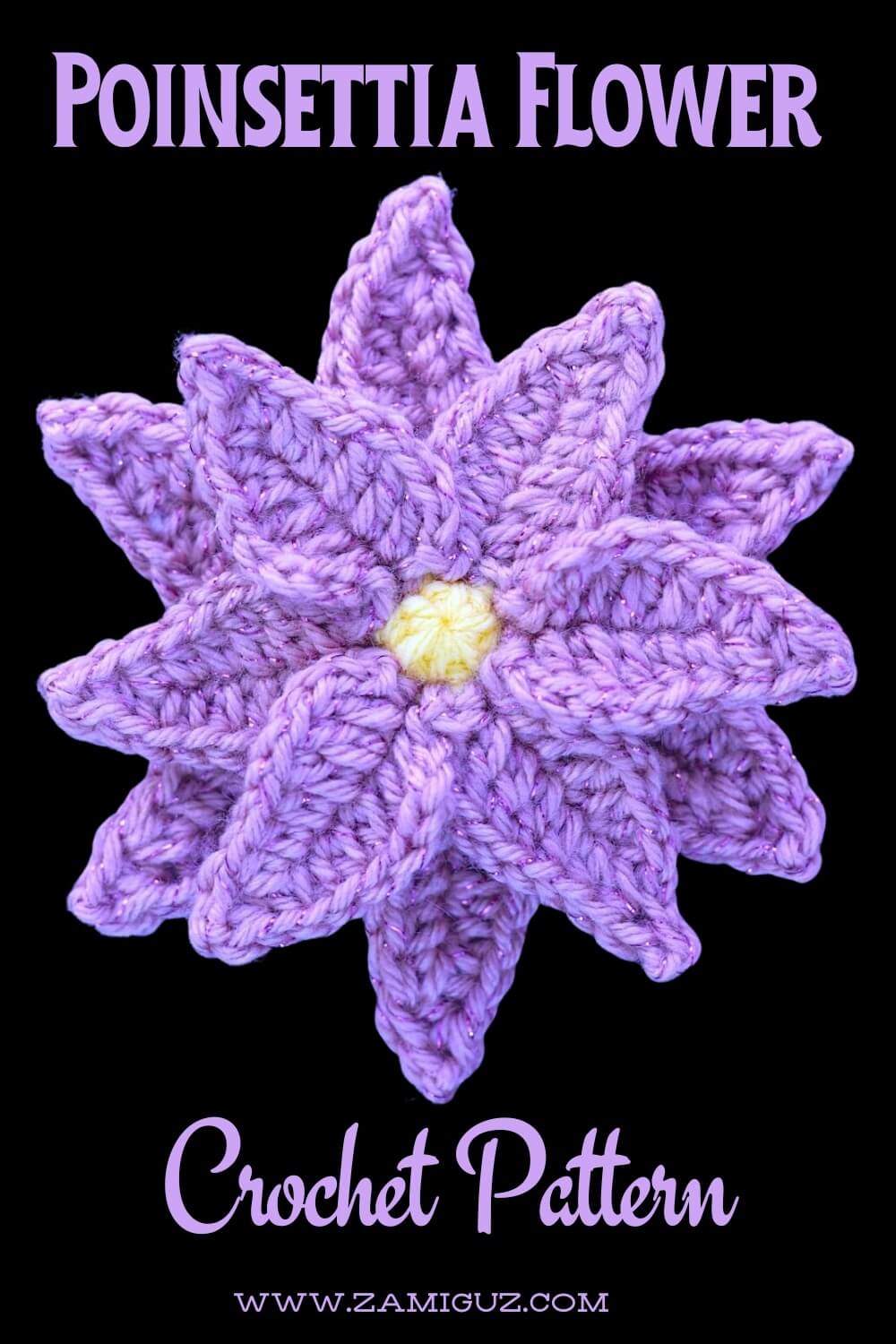 Handmade pink crochet poinsettia with textured stitches and a round yellow center.