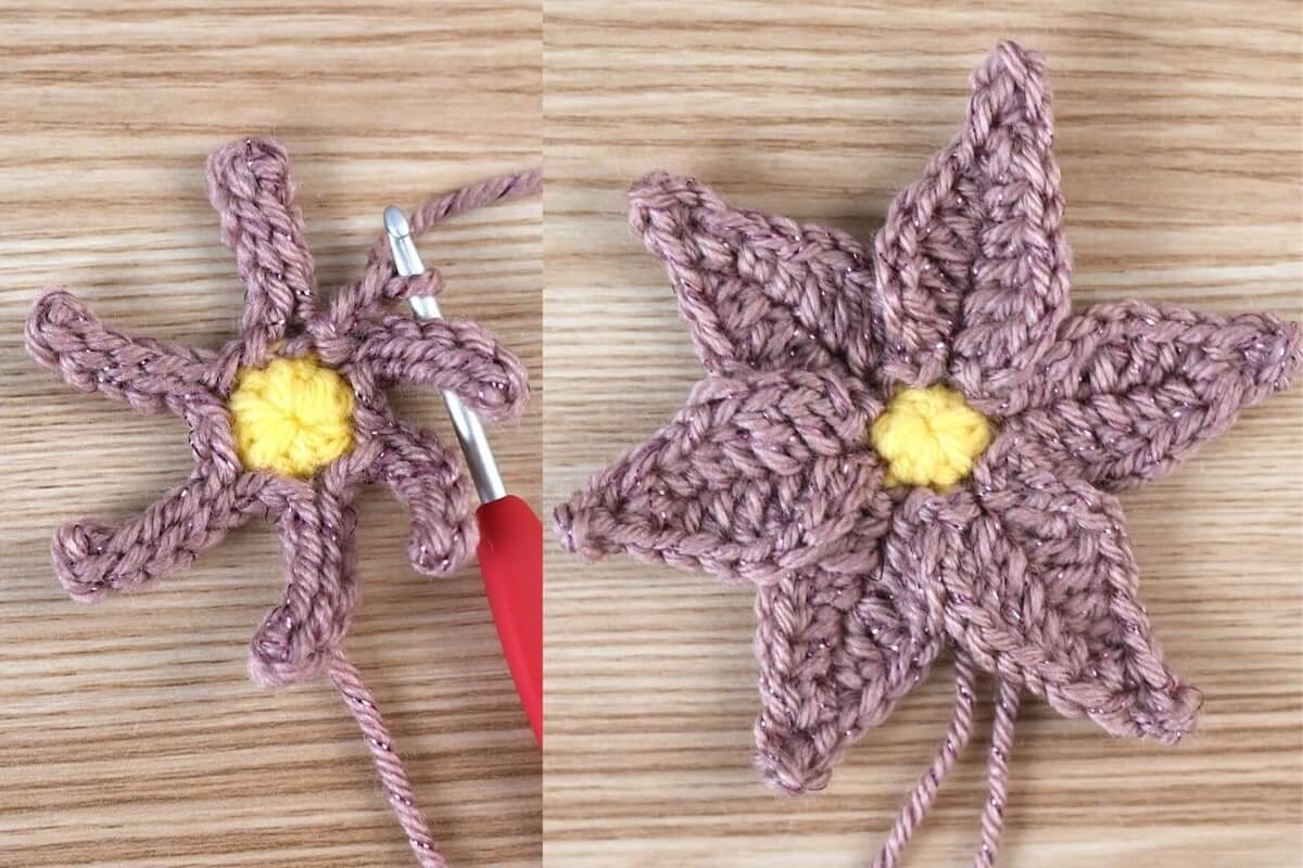 Completed base for the petals made of chains and slip stiches and finished first layer, in pink yarn.