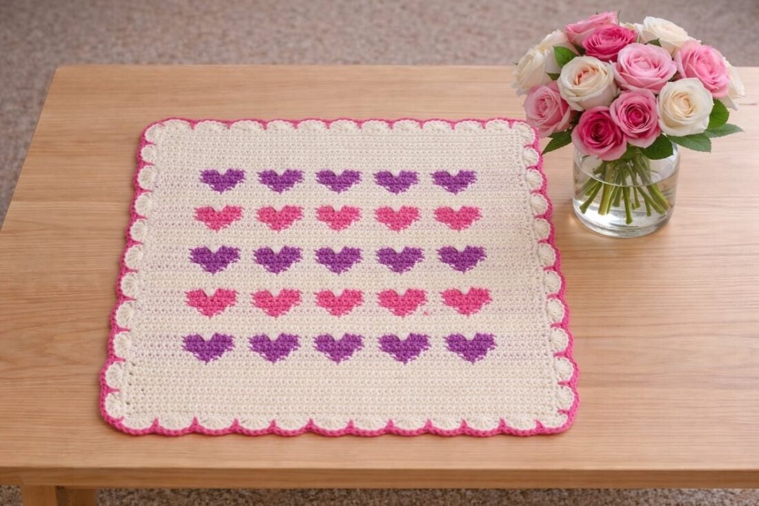 Crochet Valentine dishcloth with hearts worked in tapestry crochet technique.