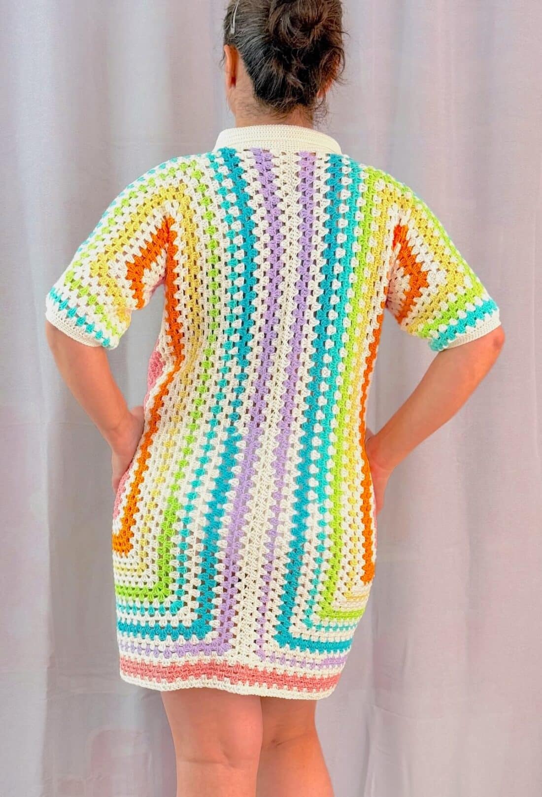 Back view of crochet hexagon dress showing extended hexagon construction and colorwork
